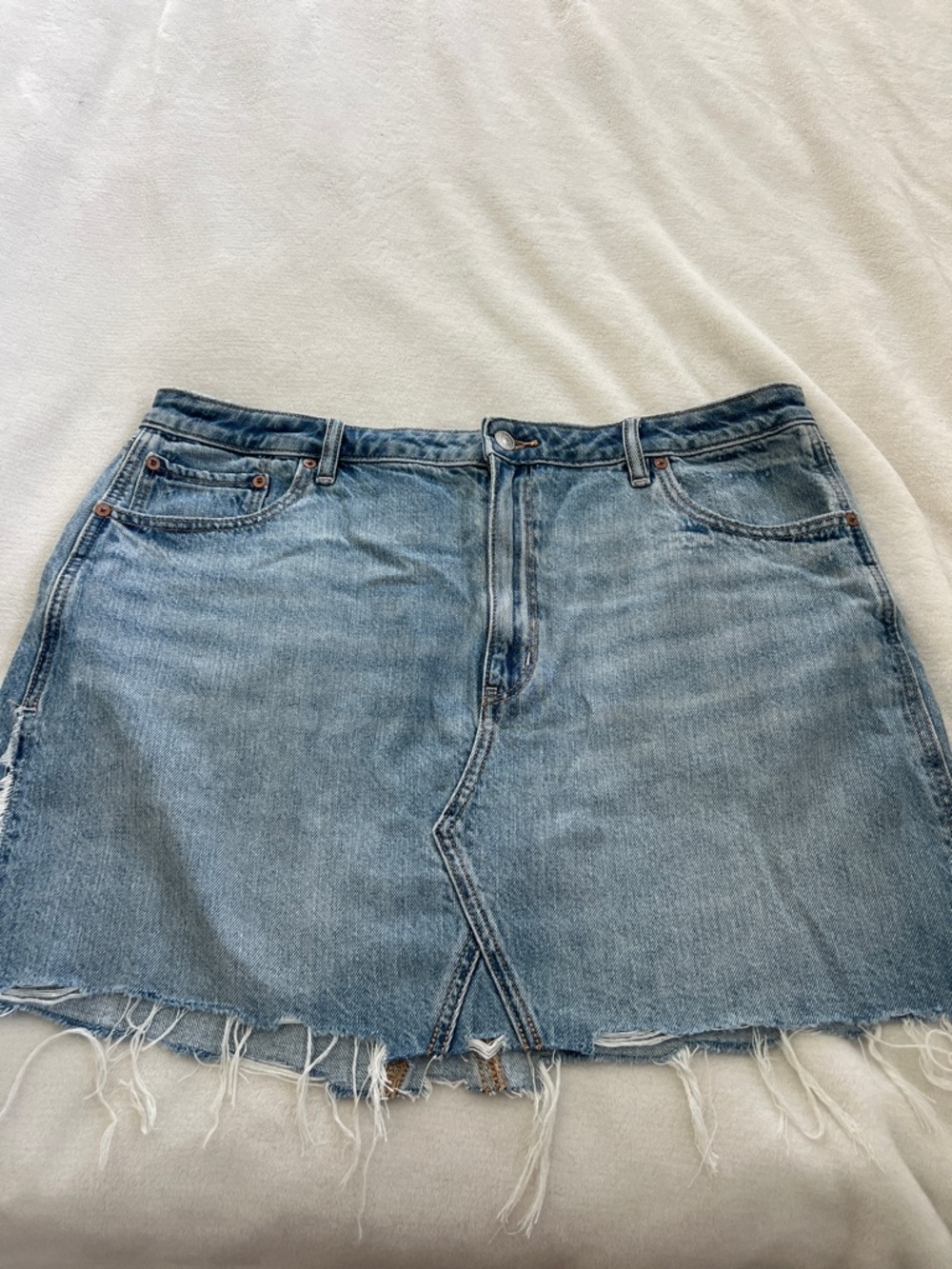 American Eagle Outfitters Light Blue Denim Mini Skirt with Frayed Hem